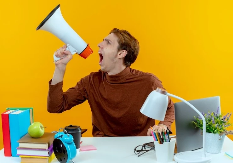 Person yelling in megaphone